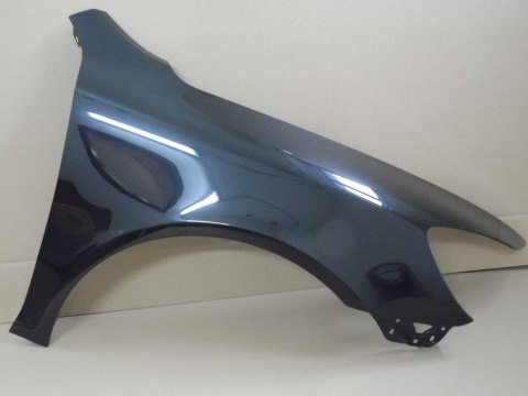 Skoda Octavia II 09-13 prawy błotnik czarny 9910