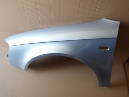 Audi A4 B7 8E 04-08 lewy błotnik srebrny LY7J