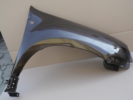 Dacia Duster 10-17 prawy błotnik brązowy CNA