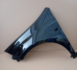 Fiat Bravo II (198) 07-16r błotnik lewy czarny 891
