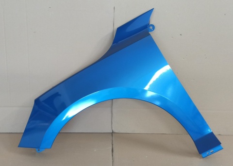 Ford Focus Mk4 18-25r. błotnik lewy niebieski JDCE
