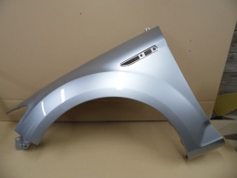 Ford Mondeo IV BA7 07-15r błotnik lewy w kolorze srebrnym ZJNC