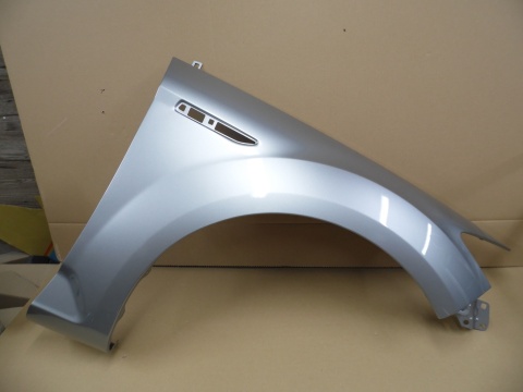 Ford Mondeo IV BA7 07-15r błotnik prawy srebrny ZJNC