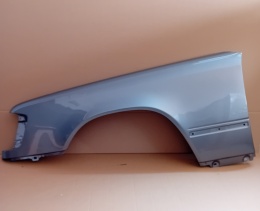 Mercedes E-Klasa W124 84-96r. błotnik lewy szary 122
