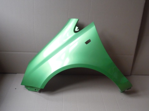 Opel Corsa D 06-14r błotnik lewy zielony Z30P