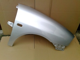 Seat Ibiza Cordoba 6L 02-08r prawy błotnik srebrny LA7W