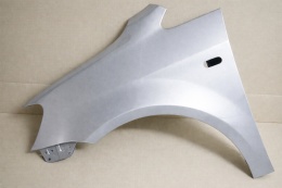 VW Caddy 3 III 2K 11-15r błotnik lewy srebrny LA7W