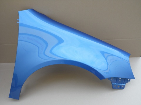 VW Golf 5 1K1 Hatchback 03-09r prawy błotnik niebieski LC5G