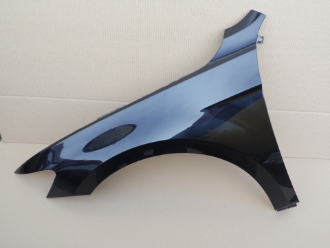 VW Passat B8 14-20r lewy błotnik czarny LC9X