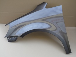 VW Touran 1T3 11-15r lewy błotnik brązowy LH8Z