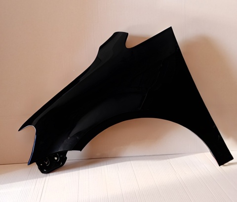 VW Touran 1T3 11-15r lewy błotnik czarny LC9X