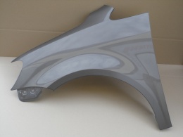 VW Touran 1T3 11-15r lewy błotnik szary LD7R