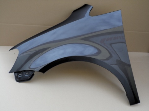 VW Touran 1T3 11-15r lewy błotnik szary LI7F